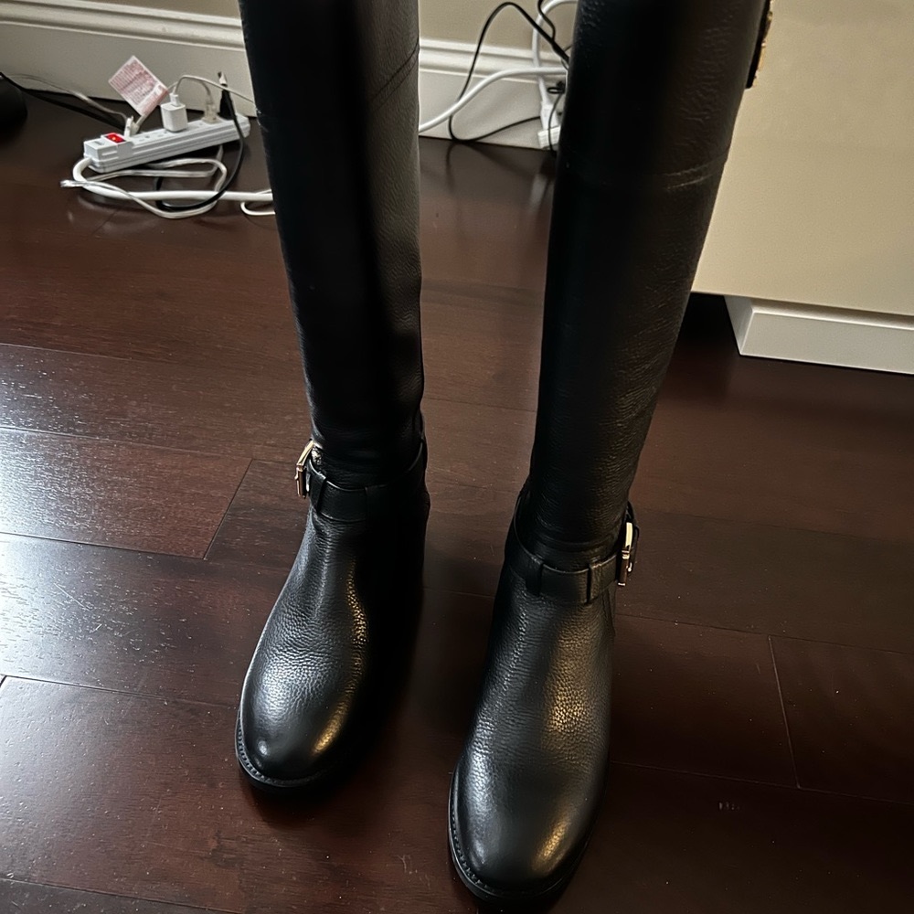 Tory Burch black leather knee high riding boots. These boots are brand new!